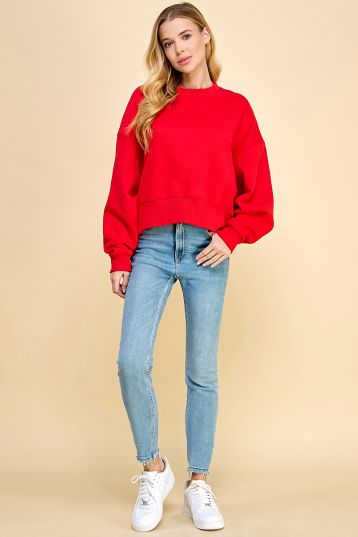 Solid Round Neck Sweatshirt with Dropped Shoulder.